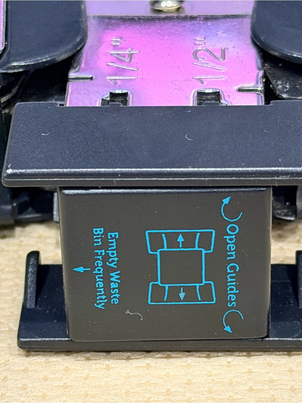 Black Handheld Paper Corner Punch with Teal Guide Markings - Picture 2 of 4
